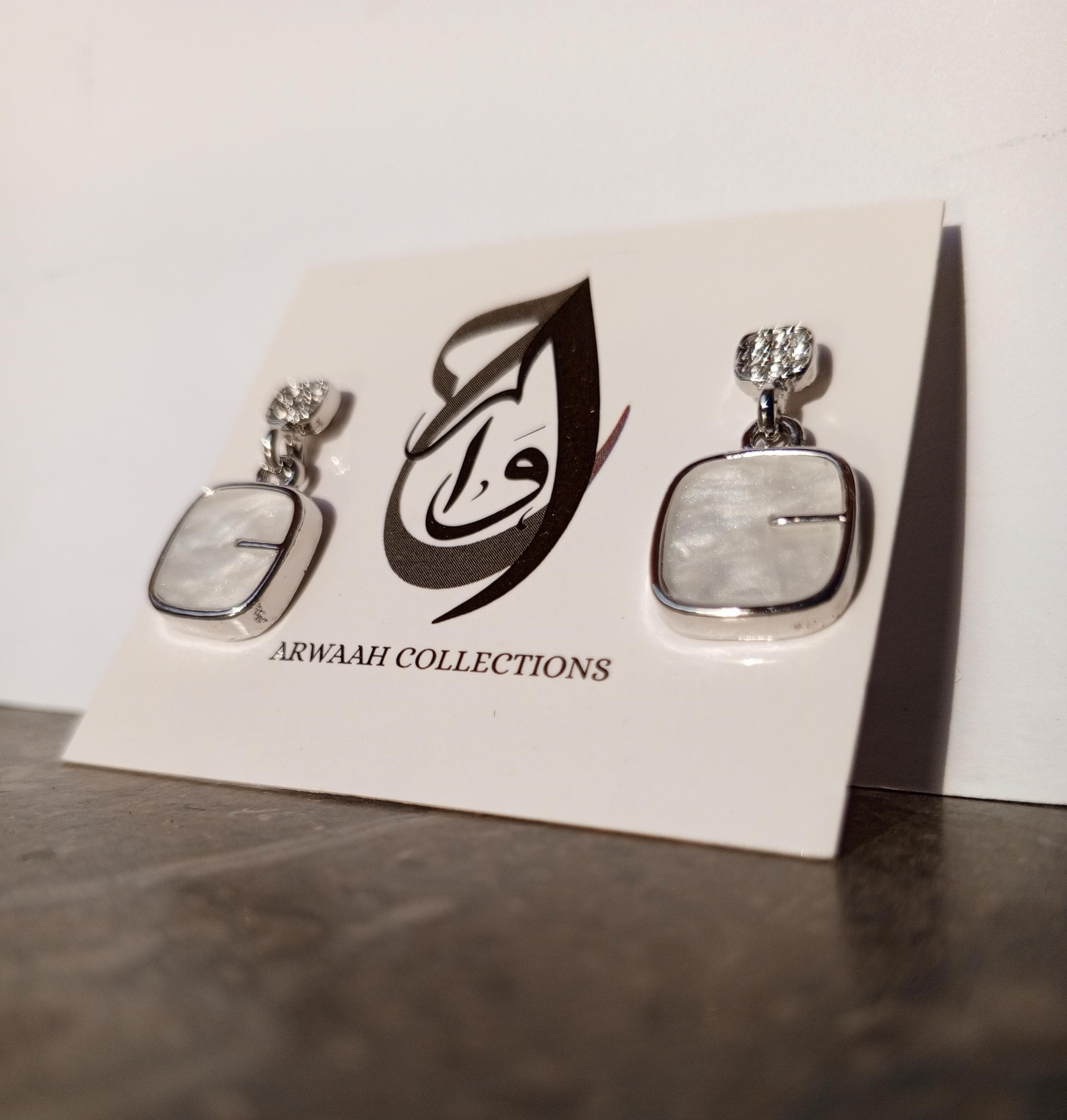 Silver-Plated Earrings with Glossy Stone Drop – ARWAAH COLLECTIONS