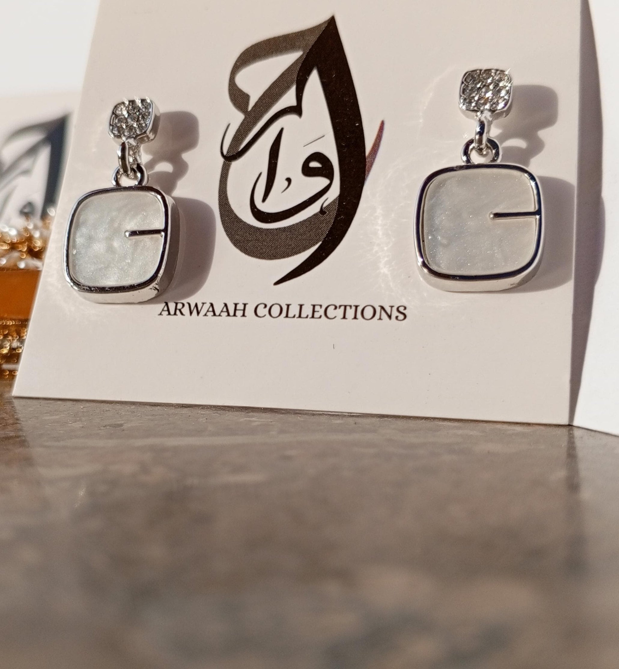 Silver-Plated Earrings with Glossy Stone Drop – ARWAAH COLLECTIONS