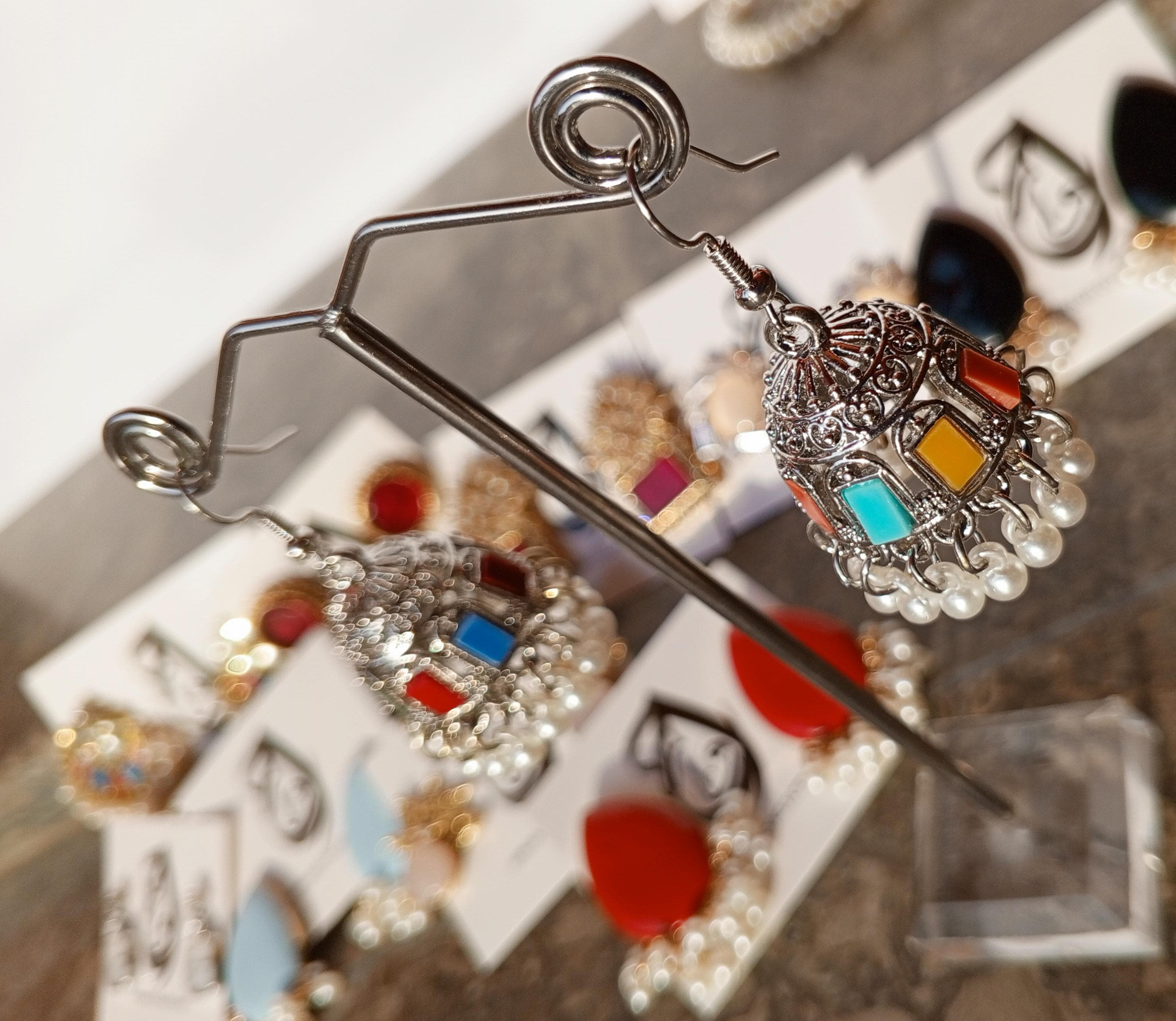Silver-Toned Jhumki Earrings with Multicolor Accents – ARWAAH COLLECTIONS