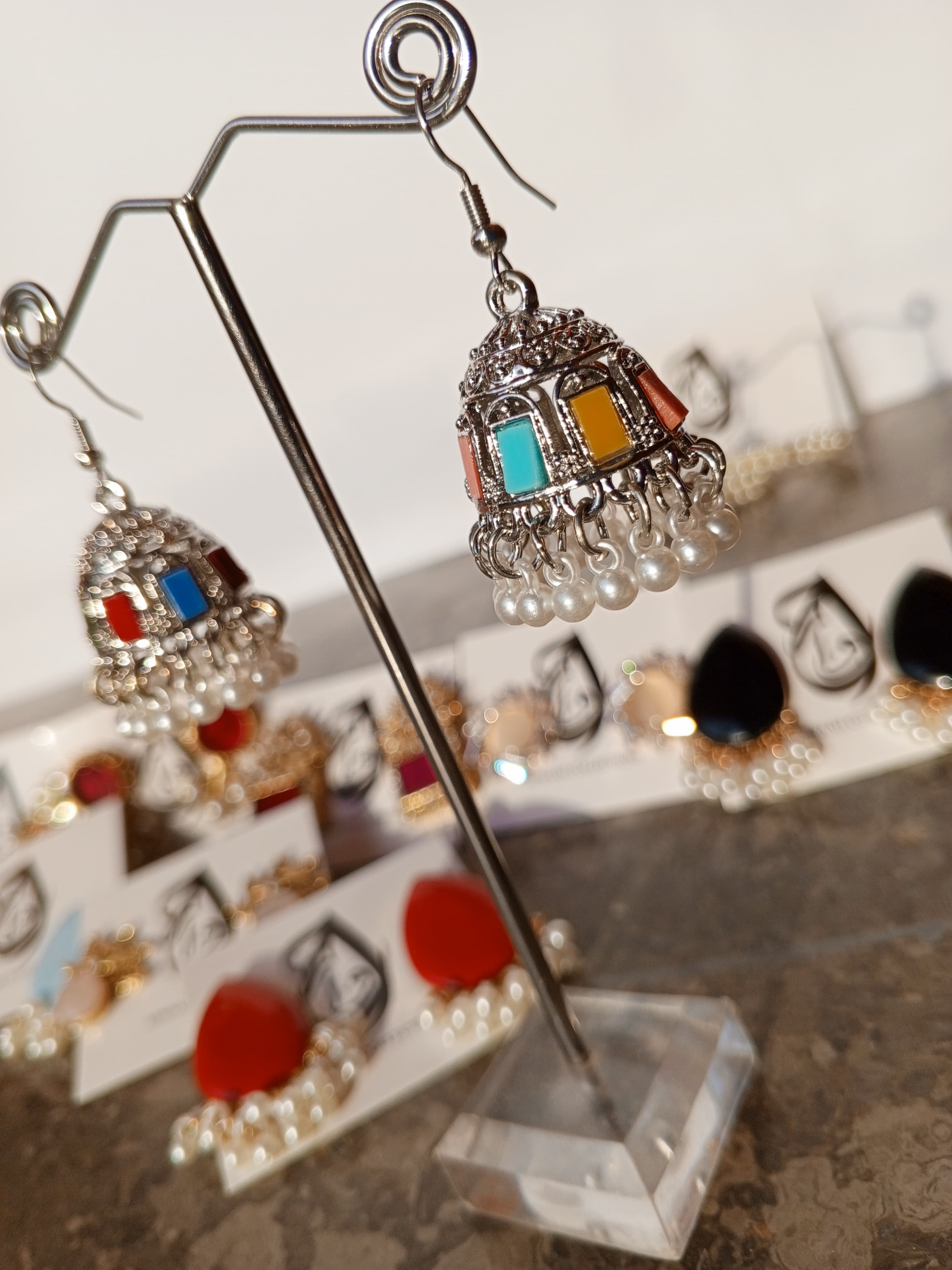 Silver-Toned Jhumki Earrings with Multicolor Accents – ARWAAH COLLECTIONS