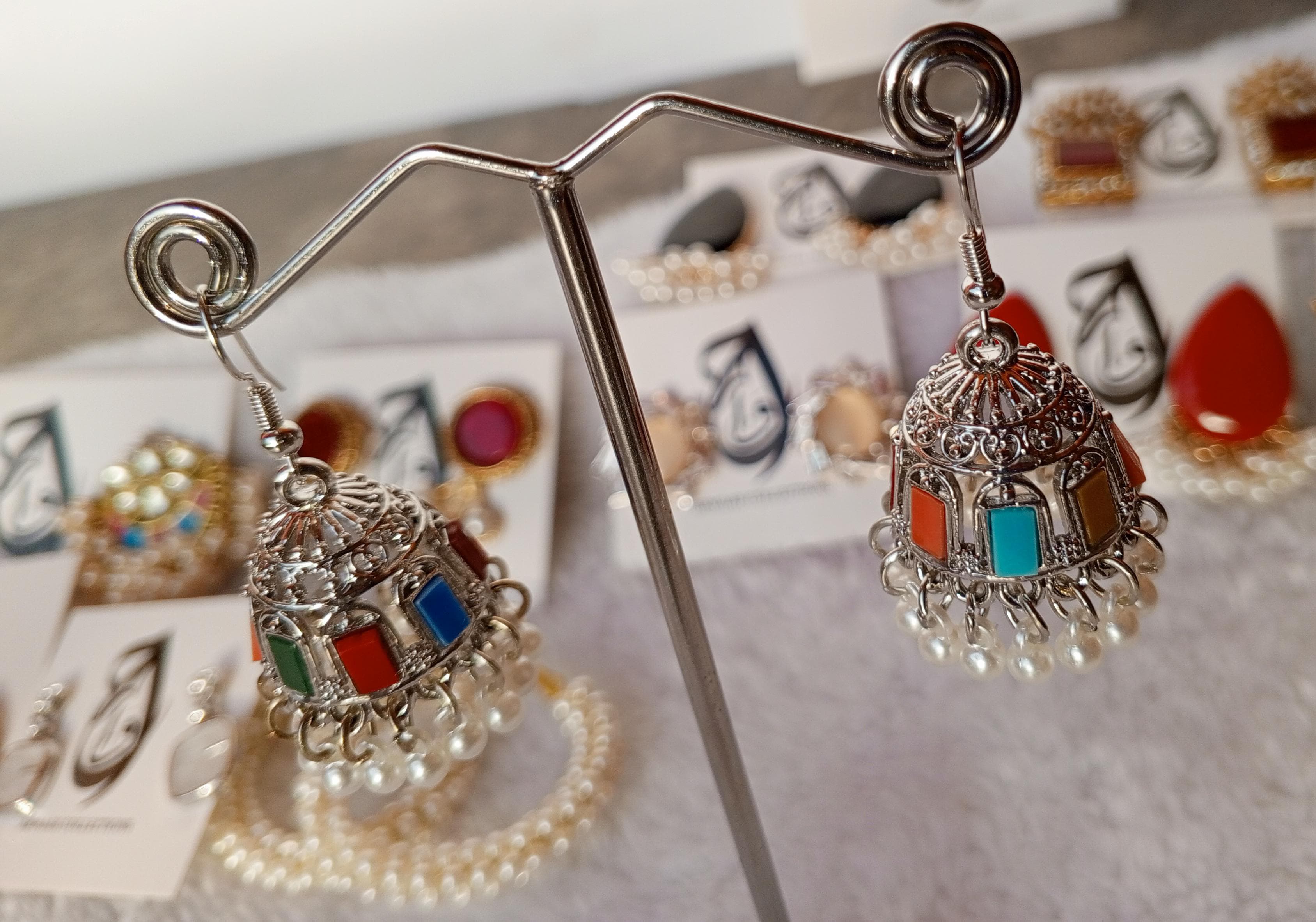 Silver-Toned Jhumki Earrings with Multicolor Accents – ARWAAH COLLECTIONS