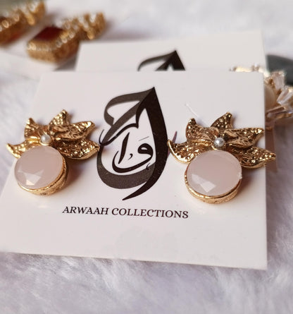 Elegant Zircon Leaf Tops with Soft Pink Stone – ARWAAH COLLECTIONS